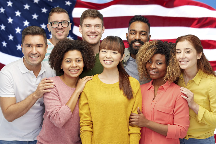 diversity, race, ethnicity and people concept - international group of happy smiling men and women over american flag background